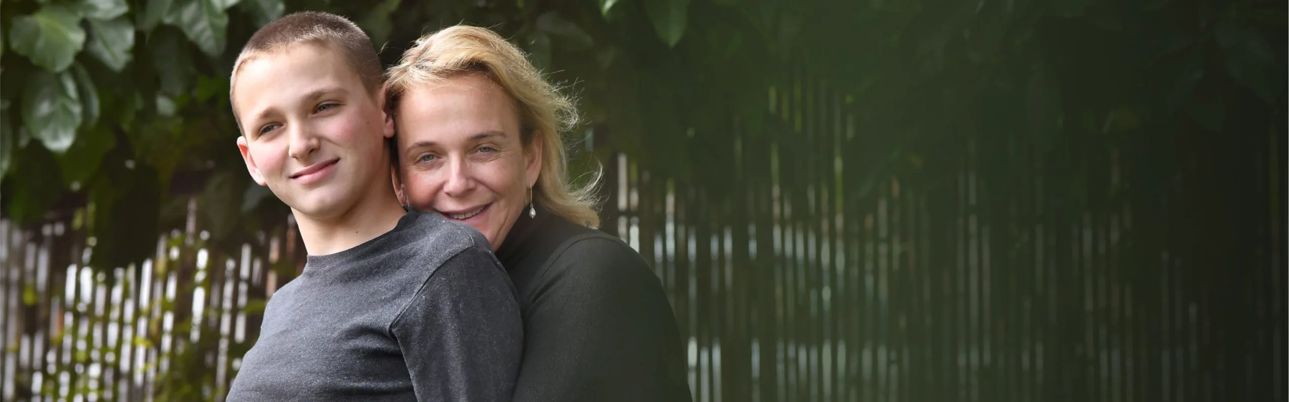 Yael Josephsberg with her son Michael, outdoors